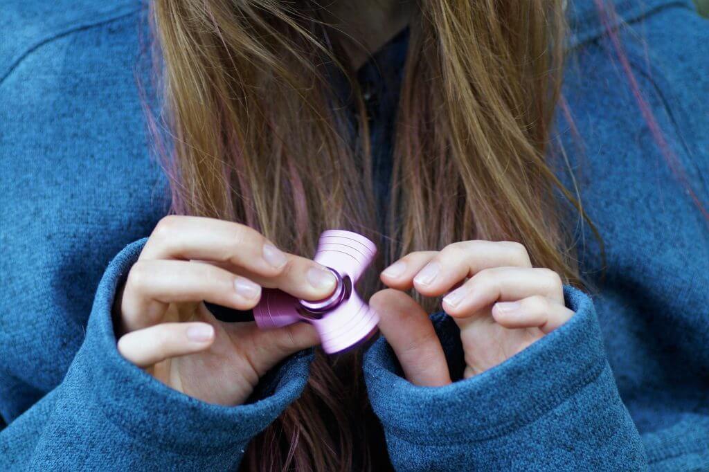 Teen with fidget