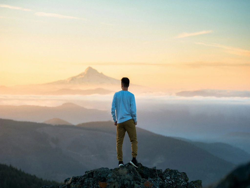 Man standing on a mountain top