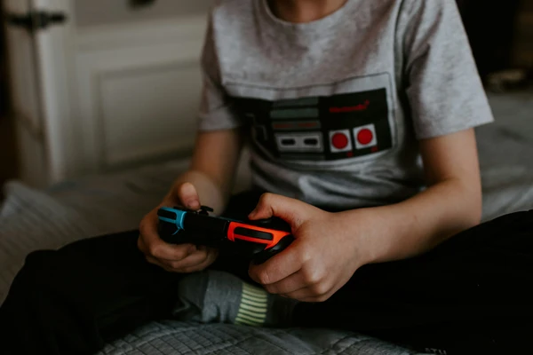 Teen boy in Oklahoma who loves video games but struggles with school