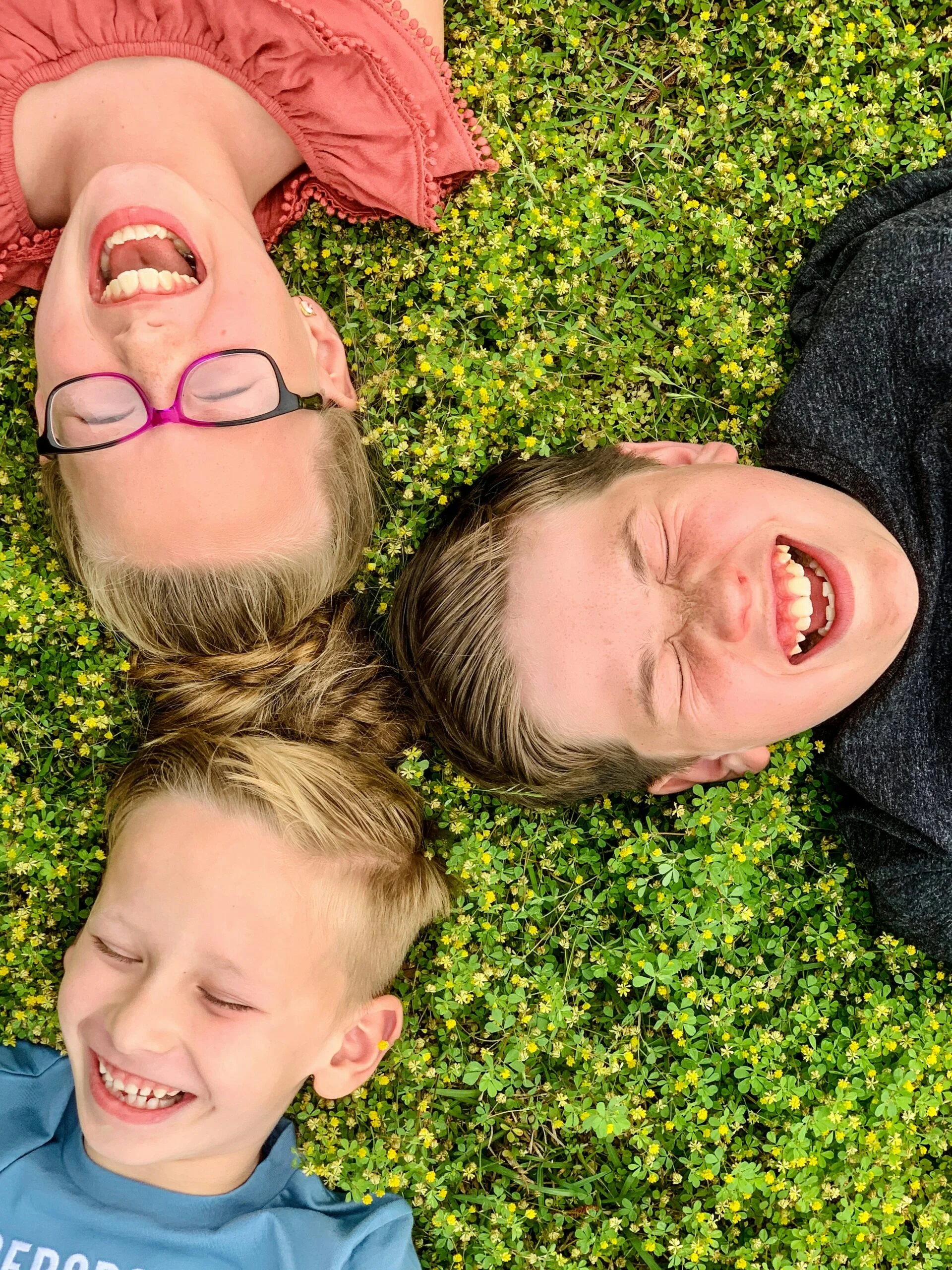 three boys laughing